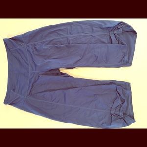 Navy blue silky Lululemon workout bottoms.